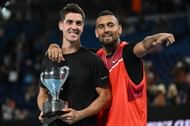 Thanasi Kokkinakis and Nick Kyrgios with the 2022 trophy.